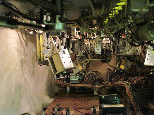 A view inside the machine, through the coin door.